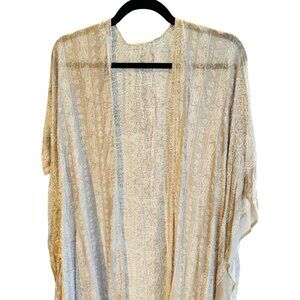 Long cream kimono with a flower design. One size cream paisley